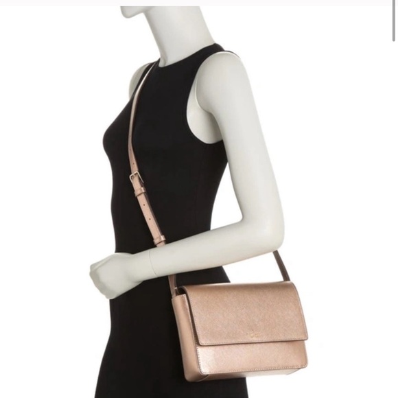 kate spade Handbags - Kate Spade Gold Crossbody Bag with Flap Closure